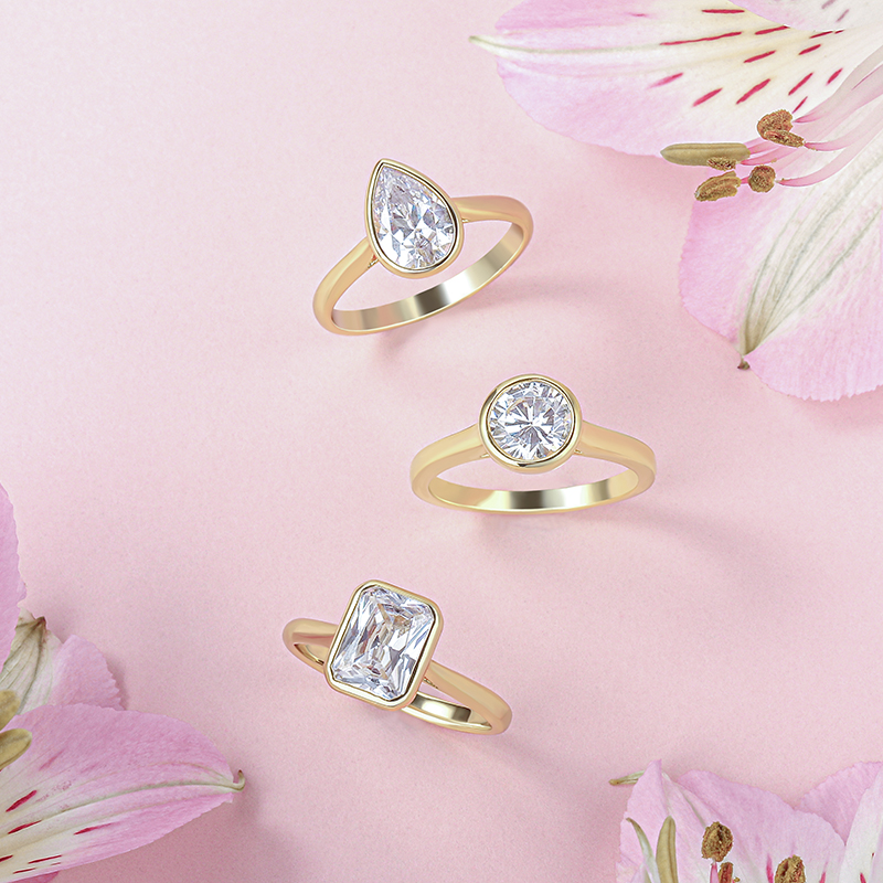 The Modern Bezel Set Engagement Ring: A Guide to Timeless Elegance